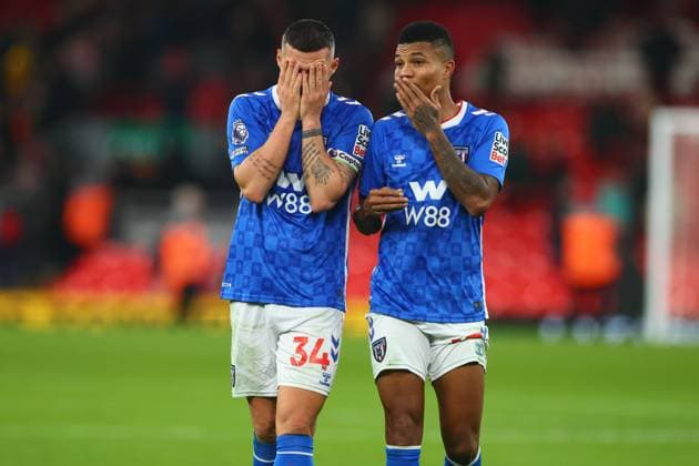 Granit Xhaka of Sunderland and Reinildo Mandava look dejected at full time Liverpool v Sunderland, Premier League, Football, Anfield, Liverpool, UK - 03 Dec 2025Liverpool Anfield United Kingdom EDITORIAL USE ONLY No use with unauthorised audio, video, data, fixture lists, club league logos or live services. Online in-match use limited to 120 images, no video emulation. No use in betting, games or single club league player publications.  Copyright: xPaulxCurrie Shutterstockx 16006099ea