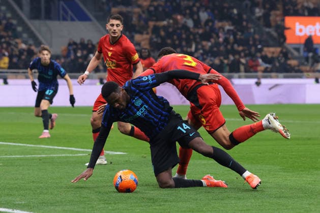 Milan, Italy, 3rd December 2025. Joel Schingtienne of Venezia FC clashes with Ange-Yoan Bonny of FC Internazionale in the penalty area during the Internazionale vs Venezia Coppa Italia match at Giuseppe Meazza, Milan. Picture credit should read: Jonathan Moscrop Sportimage EDITORIAL USE ONLY. No use with unauthorised audio, video, data, fixture lists, club league logos or live services. Online in-match use limited to 120 images, no video emulation. No use in betting, games or single club league player publications. SPI_101_JM_INTER_VENEZIA_CI SPI-4321-0099