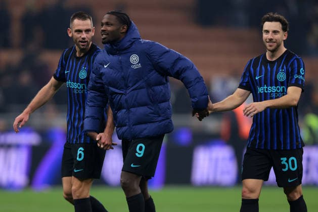 Milan, Italy, 3rd December 2025. Stefan de Vrij, Marcus Thuram and Carlos Augusto of FC Internazionale hold hands as they salute the fans following the final whistle of the Internazionale vs Venezia Coppa Italia match at Giuseppe Meazza, Milan. Picture credit should read: Jonathan Moscrop Sportimage EDITORIAL USE ONLY. No use with unauthorised audio, video, data, fixture lists, club league logos or live services. Online in-match use limited to 120 images, no video emulation. No use in betting, games or single club league player publications. SPI_110_JM_INTER_VENEZIA_CI SPI-4321-0109
