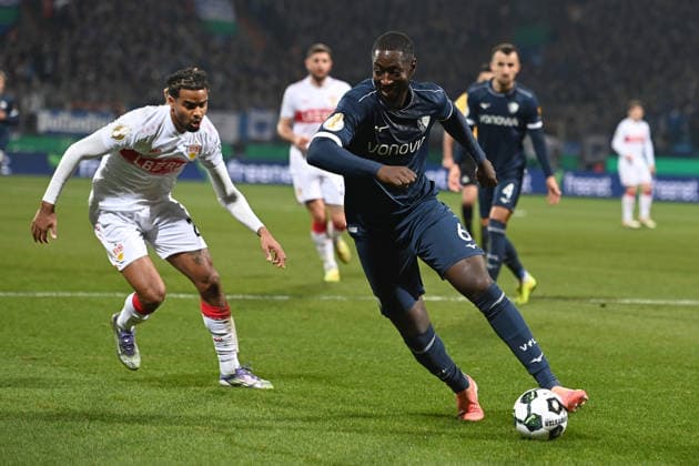 Ibrahima SISSOKO BO vs Lorenz ASSIGNON S Action, duel, Football, DFB Pokal, Round of 16, VfL Bochum BO VfB Stuttgart S 0 2 am 03 12 2025, Vonovia Ruhrstadion Bochum Germany DFL regulations prohibit any use of photographs as image sequences and or quasi video Â