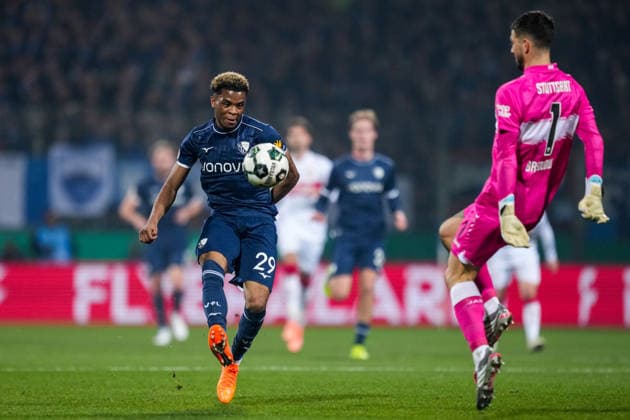 BOCHUM, GERMANY - DECEMBER 3: Farid Alfa-Ruprecht of VfL Bochum shoots past VfB Stuttgart goalkeeper Fabian Bredlow during the DFB Cup round of 16 match between VfL Bochum and VfB Stuttgart at Vonovia Ruhrstadion on December 3, 2025 in Bochum, Germany. (Photo by Rene Nijhuis) SPO  Copyright: xRenexNijhuis