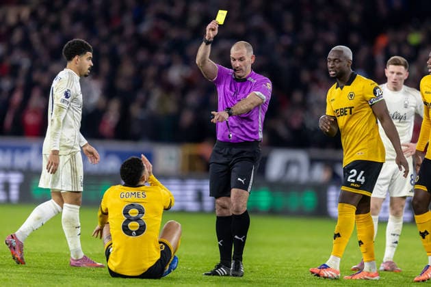 Wolverhampton Wanderers v Nottingham Forest Premier League 03 12 2025. Referee Tim Robinson books Wolverhampton Wanderers midfielder Joao Gomes (8) who now misses next game against Manchester United, ManU during the Premier League match between Wolverhampton Wanderers and Nottingham Forest at Molineux, Wolverhampton, England on 3 December 2025. Wolverhampton Molineux West Midlands England Editorial use only DataCo restrictions apply See www.football-dataco.com , Copyright: xManjitxNarotrax PSI-23331-0067