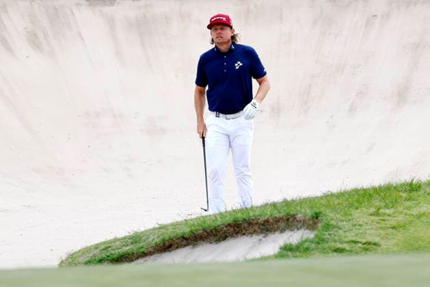 GOLF AUSTRALIAN OPEN, Cameron Smith of Australia prepares to hit out of a bunker on the third hole during the Australian Open Golf tournament at the Royal Melbourne Golf Club in Melbourne, Thursday, December 4, 2025. ( NO ARCHIVING, EDITORIAL USE ONLY MELBOURNE VICTORIA AUSTRALIA  Copyright: xCONxCHRONISx 20251204145564637005