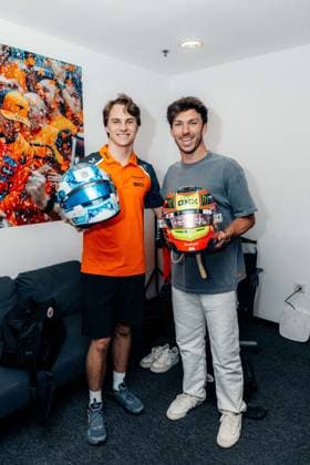 Formula 1 Abu Dhabi Grand Prix 2025 Oscar Piastri and Pierre Gasly doing a helmet swap on Media Day at the Abu Dhabi Grand Prix 2025
