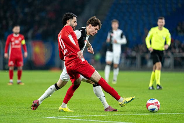 Moritz Broschinski (17 FC Basel 1893) , right, and Yannis Sghaier (11 FC Grand-Saconnex), left, in action during the Swiss Cup Round of 16 match between FC Grand-Saconnex and FC Basel 1893 at St. Jakob-Park, Basel, Switzerland. Copyright: xPriscilaxBütlerx xSPPx Sportspressphoto_SPR69782