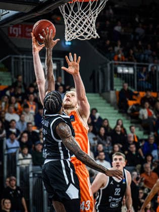 DJ Steward Dolomiti Energia Trento and Christian Sengfelder ratiopharm ulm battle for the ball during the Basketball Eurocup match between ratiopharm ulm and Dolomiti Energia Trento at ratiopharm Arena on December 4, 2025 in Neu Ulm, Germany Photo by Harry Langer DeFodi Images