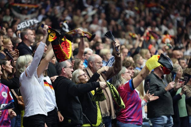 GER, Dortmund, 27th Wommens World Championship 2025, Main Round, Group II, 2 Round Round Montenegro MNE vs Germany GER 04 12 2025, Westfalenhalle, Dortmund, GER, Dortmund, 27th Wommens World Championship 2025, Main Round, Group II, 2 Round Round Montenegro MNE vs Germany GER , in the picture fans, friendly, atmosphere, colorful, national color, made up, emotions, scarves, German nordphotoxGmbHx xMeuter nph00351