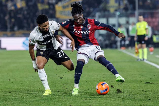 December 4, 2025, Bologna, BOLOGNA: Bologna s Jonathan Rowe (R) and Parma s Sascha Britschgi in action during the Italian Cup soccer match Bologna FC vs Parma Calcio at Renato Dall Ara stadium in Bologna, Italy, 4 December 2025. ANSA ELISABETTA BARACCHI. Soccer: Italian Cup ; Bologna-Parma  - ZUMAa110 20251204_zaf_a110_034 Copyright: xElisabettaxBaracchix
