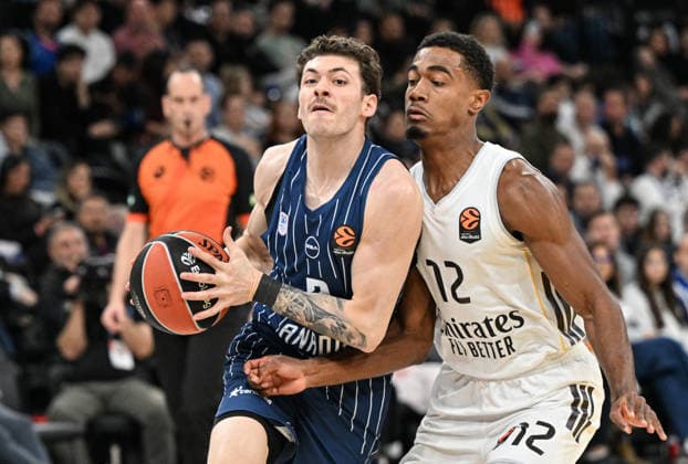 Anadolu Efes v Real Madrid - EuroLeague ISTANBUL, TURKIYE - DECEMBER 4: Sehmus Hazer (L) of Anadolu Efes in action against Theo Maledon (12) of Real Madrid during EuroLeague week 14 basketball match between Anadolu Efes and Real Madrid at Basketball Development Center in Istanbul, Turkiye on December 4, 2025. Elif Ozturk Anadolu Istanbul Turkey. Editorial use only. Please get in touch for any other usage.  Copyright: x2025xAnadoluxElifxOzturkx