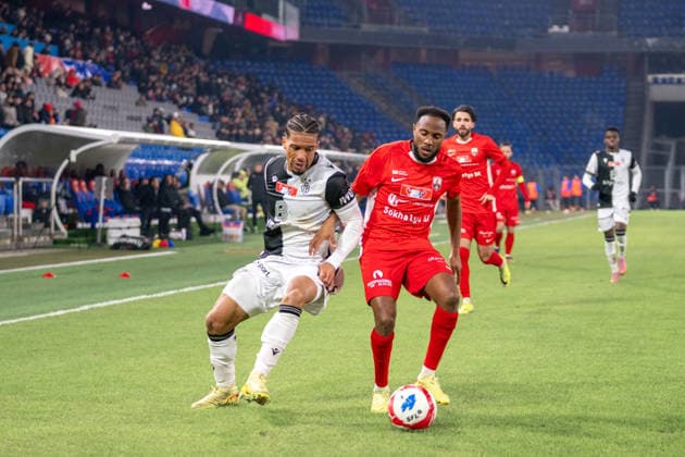 04 12 2025, Basel, St Jakob Park, Swiss Cup FC Grand Saconnex FC Basel, Kevin Rüegg 27 Basel and Passi Mafuta Gabriel 14 Grand Saconnex Basel St Jakob Park Basel Switzerland Copyright: xJustPictures.ch PascalxvonxBürenx jp-en-PaVoB-_PVB4767-1