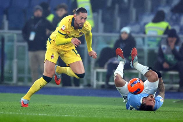 CALCIO - Coppa Italia - SS Lazio vs AC Milan Rome, Italy - December 4, 2025: Adrien Rabiot of Milan, Mario Gila Fuentes of Lazio seen in action during the Coppa Italia 2025-2026 round of 16 - football match between SS Lazio vs AC Milan at Olympic Stadium. Rome Italy  Copyright: xIPAxSport ABACAx