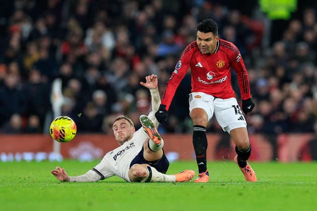Manchester United, ManU v West Ham United Premier League 04 12 2025. Casemiro (18) of Manchester United and Jarrod Bowen (20) of West Ham United challenge for the ball during the Premier League match between Manchester United and West Ham United at Old Trafford, Manchester, England on 4 December 2025. Manchester Old Trafford Greater Manchester England Editorial use only DataCo restrictions apply See www.football-dataco.com , Copyright: xConorxMolloyx PSI-23335-0024
