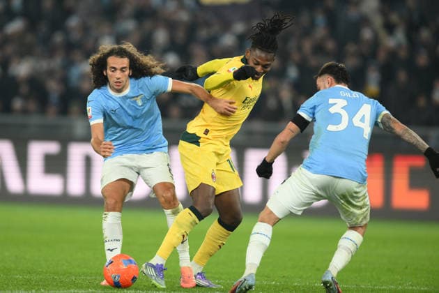 4th December 2025, Stadio Olimpico, Rome, Italy; Italian Coppa Italia Football; Lazio versus AC Milan; Rafael Leao of AC Milan under pressure from Pedro of SS Lazio, and Mario Gila of SS Lazio  AllShotLive