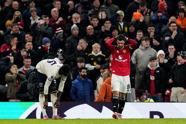 Manchester, England, 4th December 2025. Bruno Fernandes of Manchester United, ManU reacts to a missed chance on goal during the Manchester United vs West Ham United Premier League match at Old Trafford, Manchester. Picture credit should read: Andrew Yates Sportimage EDITORIAL USE ONLY. No use with unauthorised audio, video, data, fixture lists, club league logos or live services. Online in-match use limited to 120 images, no video emulation. No use in betting, games or single club league player publications. SPI_058_AY_MANUTD_WESTHAM SPI-4345-0059