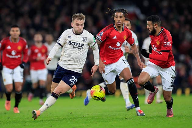 Manchester United, ManU v West Ham United Premier League 04 12 2025. Jarrod Bowen (20) of West Ham United is chased by Noussair Mazraoui (3) of Manchester United during the Premier League match between Manchester United and West Ham United at Old Trafford, Manchester, England on 4 December 2025. Manchester Old Trafford Greater Manchester England Editorial use only DataCo restrictions apply See www.football-dataco.com , Copyright: xConorxMolloyx PSI-23335-0068