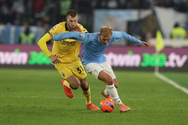 December 4, 2025, Rome, Lazio, Italy: Gustav Isaksen of Lazio and Strahinja Pavlovic of Milan during Coppa Italia soccer match round of 16 between SS Lazio and AC Milan at Stadio Olimpico on October 26, 2025 in Rome , Italy. Rome Italy - ZUMAl131 20251204_zsp_l131_024 Copyright: xCiroxDexLucax