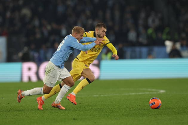 December 4, 2025, Rome, Lazio, Italy: Gustav Isaksen of Lazio and Strahinja Pavlovic of Milan during Coppa Italia soccer match round of 16 between SS Lazio and AC Milan at Stadio Olimpico on October 26, 2025 in Rome , Italy. Rome Italy - ZUMAl131 20251204_zsp_l131_036 Copyright: xCiroxDexLucax