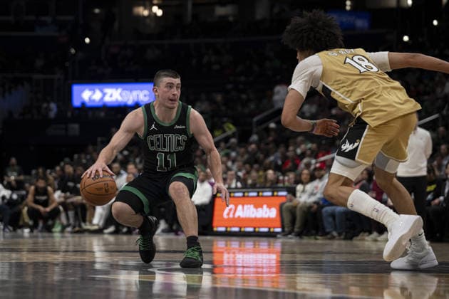 Boston Celtics v Washington Wizards - NBA, Basketball Herren, USA WASHINGTON DC, UNITED STATES - NOVEMBER 4 : Kyshawn George (18) of Washington Wizards in action against Payton Pritchard (11) of Boston Celtics during the NBA basketball game between Boston Celtics and Washington Wizards at the Capital One Arena in Washington DC, United States on December 04, 2025. Celal Gunes Anadolu Washington United States. Editorial use only. Please get in touch for any other usage.  Copyright: x2025xAnadoluxCelalxGunesx