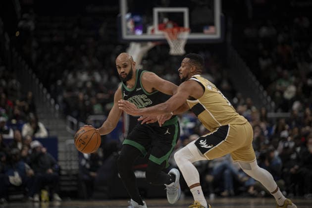 Boston Celtics v Washington Wizards - NBA, Basketball Herren, USA WASHINGTON DC, UNITED STATES - NOVEMBER 4 : CJ McCollum (3) of Washington Wizards in action against Derrick White (9) of Boston Celtics during the NBA basketball game between Boston Celtics and Washington Wizards at the Capital One Arena in Washington DC, United States on December 04, 2025. Celal Gunes Anadolu Washington United States. Editorial use only. Please get in touch for any other usage.  Copyright: x2025xAnadoluxCelalxGunesx