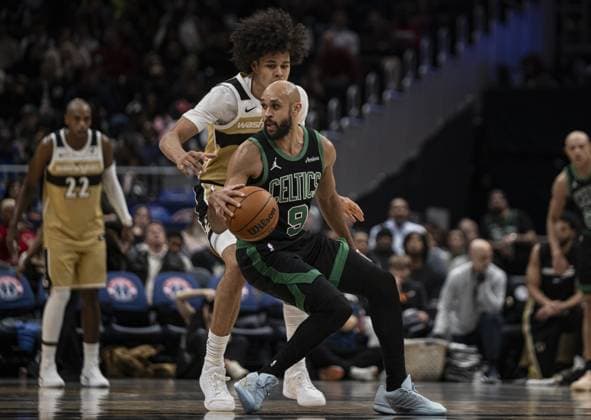 Boston Celtics v Washington Wizards - NBA, Basketball Herren, USA WASHINGTON DC, UNITED STATES - NOVEMBER 4 : Kyshawn George (18) of Washington Wizards in action against Derrick White (9) of Boston Celtics during the NBA basketball game between Boston Celtics and Washington Wizards at the Capital One Arena in Washington DC, United States on December 04, 2025. Celal Gunes Anadolu Washington United States. Editorial use only. Please get in touch for any other usage.  Copyright: x2025xAnadoluxCelalxGunesx