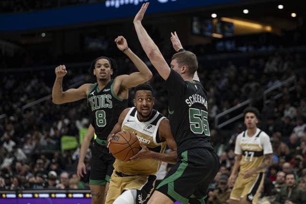 Boston Celtics v Washington Wizards - NBA, Basketball Herren, USA WASHINGTON DC, UNITED STATES - NOVEMBER 4 : CJ McCollum (3) of Washington Wizards in action against Josh Minott (8) and Baylor Scheierman (55) of Boston Celtics during the NBA basketball game between Boston Celtics and Washington Wizards at the Capital One Arena in Washington DC, United States on December 04, 2025. Celal Gunes Anadolu Washington United States. Editorial use only. Please get in touch for any other usage.  Copyright: x2025xAnadoluxCelalxGunesx