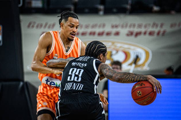 Nelson Weidemann ratiopharm ulm and Khalif Battle Dolomiti Energia Trento battle for the ball during the Basketball Eurocup match between ratiopharm ulm and Dolomiti Energia Trento at ratiopharm Arena on December 4, 2025 in Neu Ulm, Germany Photo by Harry Langer DeFodi Images