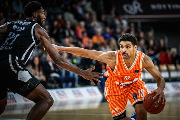 Selom Mawugbe Dolomiti Energia Trento and Mark Smith ratiopharm ulm battle for the ball during the Basketball Eurocup match between ratiopharm ulm and Dolomiti Energia Trento at ratiopharm Arena on December 4, 2025 in Neu Ulm, Germany Photo by Harry Langer DeFodi Images