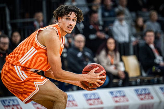Alec Anigbata ratiopharm ulm controls the Ball during the Basketball Eurocup match between ratiopharm ulm and Dolomiti Energia Trento at ratiopharm Arena on December 4, 2025 in Neu Ulm, Germany Photo by Harry Langer DeFodi Images