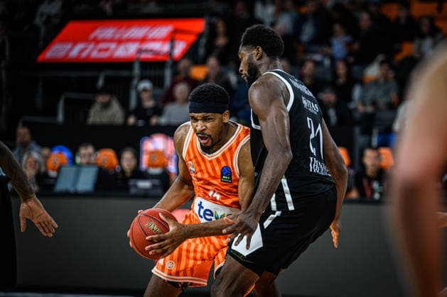 Justin Simon ratiopharm ulm and Selom Mawugbe Dolomiti Energia Trento battle for the ball during the Basketball Eurocup match between ratiopharm ulm and Dolomiti Energia Trento at ratiopharm Arena on December 4, 2025 in Neu Ulm, Germany Photo by Harry Langer DeFodi Images
