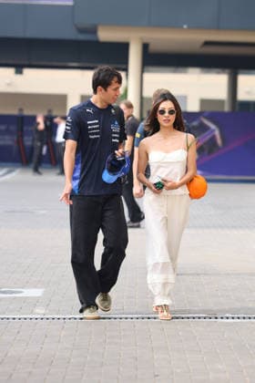 Alexander Albon Atlassian Williams Racing, 23 with partner Lily Muni He professional golfer , ARE, Formula 1 World Championship, Abu Dhabi Grand Prix, Yas Marina Circuit, Friday, 05 12 2025 ARE, Formula 1 World Championship, Abu Dhabi Grand Prix, United Arab Emirates, Yas Marina Circuit, 05 12 2025 Abu Dhabi Copyright: xEibner-Pressefoto AnnikaxGrafx EP_AGF