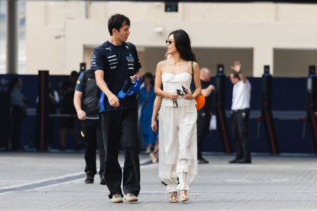 December 5, 2025, Abu Dhabi, Abu Dhabi, United Arab Emirates: 23 ALEXANDER ALEX ALBON (THA, Williams Racing F1 Team) with his girlfriend LILI MUNI HE arriving at the paddock during Free Practice Day (Friday) at the Formula 1 Etihad Airways Abu Dhabi Prix 2025 at the Yas Marina Circuit in Abu Dhabi, United Arab Emirates Abu Dhabi United Arab Emirates - ZUMAr193 20251205_zsp_r193_007 Copyright: xSaraxRuffonix