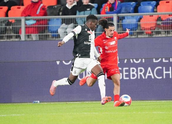 04 12 2025 Basel Switzerland Soccer Men Season 2025 2026 Cup FC Basel FC Grand Saconnex 3 1 Picture Metinho FC Basel vs Matteo Regillo FC Grand Saconnex r Action duel