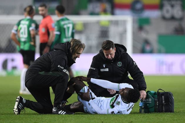 Soccer 2 Bundesliga 15 Matchday SC Preußen Münster Hannover 96 on 05 12 2025 at LVM Preußenstadion in Münster Mustapha Bundu Hannover injured on the ground DFL regulations prohibit any use of photographs as image sequences and or quasi video xRx