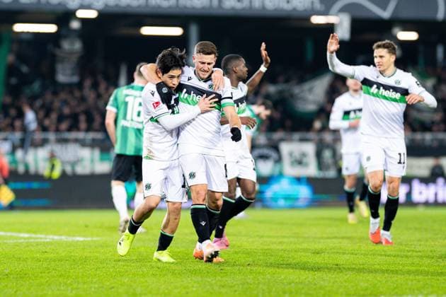 05 12 2025 Soccer, 2025 2026, 2 Bundesliga, Matchday 15, SC Preußen Münster Hannover 96 L R Daisuke Yokota Hannover celebrates after his goal to 0 2 with Enzo Leopold Hannover DFL REGULATIONS PROHIBIT ANY USE OF PHOTOGRAPHS AS IMAGE SEQUENCES AND OR QUASI VIDEO