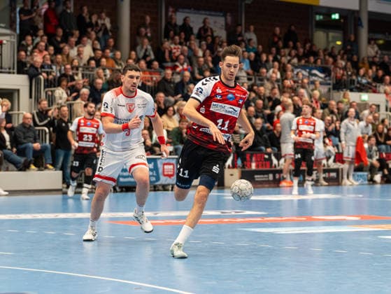 Tarek Marschall HSG Nordhorn Lingen, 11 in duel against Josip Eres TuS Ferndorf, 03 HSG Nordhorn Lingen vs TuS Ferndorf, Handball, 2 Bundesliga, Matchday 14, Season 2025 2026, 05 12 2025 HSG Nordhorn Lingen vs TuS Ferndorf, Handball, 2 Bundesliga, Matchday 14, Season 2025 2026, 05 12 2025 Nordhorn Copyright: xEibner-Pressefoto DamianxKruczynx EP_DKI