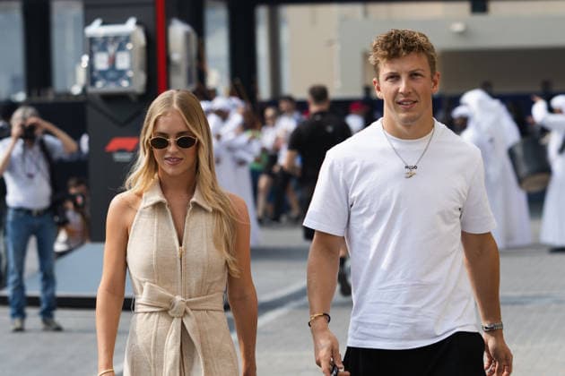 December 6, 2025, Abu Dhabi, Abu Dhabi, United Arab Emirates: 30 LIAM LAWSON (NZL, Visa Cash App Racing Bulls F1 Team) and his girlfreind HANNAH ST. JONES entering the paddock during Quali Day (Sunday) at the Formula 1 Etihad Airways Abu Dhabi Prix 2025 at the Yas Marina Circuit in Abu Dhabi, United Arab Emirates Abu Dhabi United Arab Emirates - ZUMAr193 20251206_zsp_r193_005 Copyright: xSaraxRuffonix