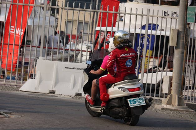 06 12 2025, Yas Marina Circuit, Abu Dhabi, Formula 1 Etihad Airways Abu Dhabi Grand Prix 2025 , pictured After his accident, Lewis Hamilton GBR , Scuderia Ferrari HP is brought back to the paddock by scooter Photo by Alessandro Martellotta Hasan Bratic DeFodi Images