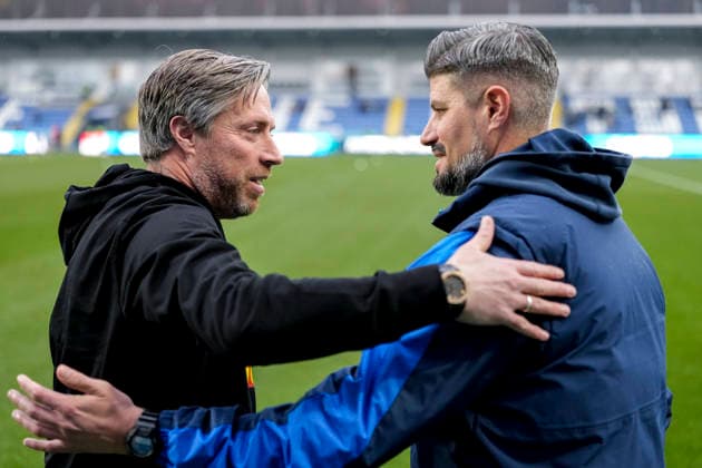 from left Michael Wimmer coach, head coach, Regensburg and Stefan Kleineheismann coach, head coach, TSG II , at the greeting before the game, both coaches greet each other, Action, Action, 06 12 2025, Sinsheim Germany , Soccer, 3 Liga, TSG 1899 Hoffenheim II SSV Jahn Regensburg, DFB DFL REGULATIONS PROHIBIT ANY USE OF PHOTOGRAPHS AS IMAGE SEQUENCES AND OR QUASI VIDEO xozx