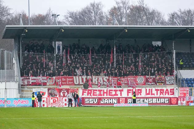 The fans of SSV Jahn Regensburg show a banner, banner with the inscription Freedom for Ultras, fans, Ultras audience, spectators, mood, atmosphere, stadium, protest, protest action for the preservation of fan culture in the fan curve, protest, Action, Action, 06 12 2025, Sinsheim Germany , Football, 3 Liga, TSG 1899 Hoffenheim II SSV Jahn Regensburg, DFB DFL REGULATIONS PROHIBIT ANY USE OF PHOTOGRAPHS AS IMAGE SEQUENCES AND OR QUASI VIDEO xozx