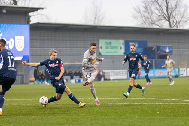 06 12 2025, Soccer, GER, Season, 3 Liga, Season 2025 2026, 17 Matchday, TSG Hoffenheim II SSV Jahn Regensburg Valentin Lässig vs Christian Kühlwetter SSV Jahn Regensburg DFL REGULATIONS PROHIBIT ANY USE OF PHOTOGRAPHS AS IMAGE SEQUENCES AND OR QUASI VIDEO