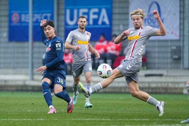 Soccer 3 Liga, Matchday 17, TSG Hoffenheim II Jahn Regensburg on 06 12 2025 in Sinsheim Dietmar Hopp Stadion , Germany, Season 2025 2026 DFB DFL REGULATIONS PROHIBIT ANY USE OF PHOTOGRAPHS as IMAGE SEQUENCES and or QUASI VIDEO Deniz Zeitler 38, TSGII shoots on goal, Philipp Müller 5, SSV tries to block the shot Sinsheim Dietmar Hopp Stadion Germany Copyright: xChristophxKinzingerx