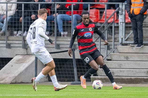 06 12 25, Soccer 3 Liga, Season 2025 2026, Matchday 17, Viktoria Koeln SSV Ulm 1846 at Sportpark Hoehenberg duel between Max Scholze SSV Ulm 1846, 28 and Yannik Aime Tonye Viktoria Koeln, 30 Important note According to the regulations of the DFL German Football League and the DFB German Football Association, it is prohibited, to utilize or have utilized photographs taken in the stadium and or of the match in the form of sequential images and or video-like photo series Foto Kirchner Media Thomas Haesler Copyright: xKirchner-Media ThomasxHaeslerx