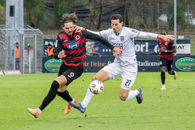 06 12 25, Soccer 3 Liga, Season 2025 2026, Matchday 17, Viktoria Koeln SSV Ulm 1846 at Sportpark Hoehenberg duel between Lex Tyger Lobinger Viktoria Koeln, 09 and Lukas Mazagg SSV Ulm 1846, 27 Important note According to the regulations of the DFL German Football League and the DFB German Football Association, it is prohibited, to utilize or have utilized photographs taken in the stadium and or of the match in the form of sequential images and or video-like photo series Foto Kirchner Media Thomas Haesler Copyright: xKirchner-Media ThomasxHaeslerx