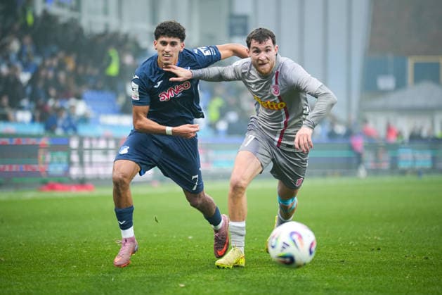 Soccer 3 Liga, Matchday 17, TSG Hoffenheim II Jahn Regensburg on 06 12 2025 in Sinsheim Dietmar Hopp Stadion , Germany, Season 2025 2026 DFB DFL REGULATIONS PROHIBIT ANY USE OF PHOTOGRAPHS as IMAGE SEQUENCES and or QUASI VIDEO Ayoub Amaimouni Echghouyab 7, TSGII in duel with Oscar Schönfelder 7, SSV Sinsheim Dietmar Hopp Stadion Germany Copyright: xChristophxKinzingerx
