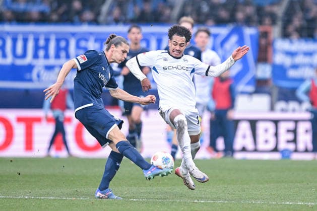 06 12 2025, Soccer, 2 Bundesliga, 15 Matchday Season 2025 2026, VfL Bochum DSC Arminia Bielefeld, Kjell Wätjen VfL Bochum 1848 , Monju Momuluh DSC Arminia Bielefeld xRHR PHOTO TKx Copyright: RHR-FOTOx RHR-FOTO TK