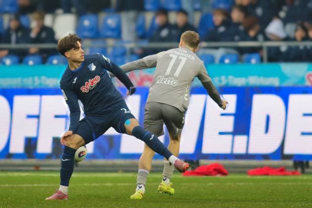 v li in duel, Luca Erlein TSG Hoffenheim II, 24 , Noel Eichinger SSV Jahn Regensburg, 11 GER, TSG 1899 Hoffenheim II vs SSV Jahn Regensburg, Football, 3 Liga, Matchday 17, Season 2025 2026, 06 12 2025 DFL DFB REGULATIONS PROHIBIT ANY USE OF PHOTOGRAPHS as IMAGE SEQUENCES and or QUASI VIDEO GER,TSG 1899 Hoffenheim II vs SSV Jahn Regensburg, Football, 3 Liga, Matchday 17, Season 2025 2026, 06 12 2025 Hoffenheim Copyright: xEibner-Pressefoto JoergxHirschx EP_JHH
