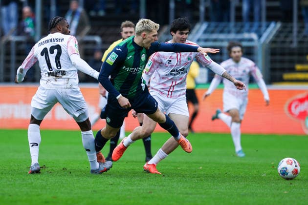 06 12 2025, xKWIx, Football, Regionalliga West, FC Gütersloh RW Oberhausen, Ohlendorf Stadion im Heidewald Luis Frieling FC Gütersloh 21 in duel against Matona Glody Ngyombo Rot Weiß Oberhausen 17 Photo xKamilxWilkowskixPressefotoKochx NRW Germany