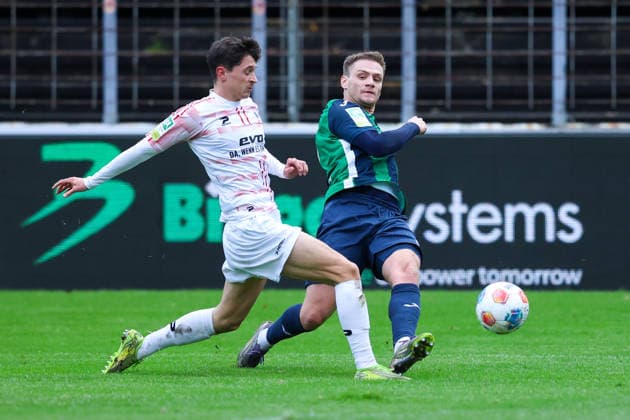 06 12 2025, xKWIx, Soccer, Regionalliga West, FC Gütersloh RW Oberhausen, Ohlendorf Stadion im Heidewald Lucas Halangk Rot Weiß Oberhausen 22 in duel against Jan Lukas Liehr FC Gütersloh 7 Photo xKamilxWilkowskixPressefotoKochx NRW Germany