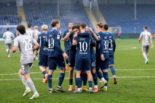 Players of TSG 1899 Hoffenheim II U23 cheer about the goal to 1 0, cheer, goal celebration, celebrate the goal, goal, celebration, cheers about the goal, rejoicing, joy, rejoices, optimistic, positive, game scene, Highlight, Action, Action, 06 12 2025, Sinsheim Germany , Soccer, 3 Liga, TSG 1899 Hoffenheim II SSV Jahn Regensburg, DFB DFL REGULATIONS PROHIBIT ANY USE OF PHOTOGRAPHS AS IMAGE SEQUENCES AND OR QUASI VIDEO xozx