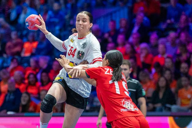 2025-12-06 Austria vs Tunisia ROTTERDAM, NETHERLANDS - DECEMBER 6: Santina Sabatnig of Austria and Nada Zelfani of Tunisia during the IHF Worldchampionship 2025 match for women, between Austria and Tunisia at Ahoy on December 6, 2025 in Rotterdam, Netherlands. Rotterdam Ahoy Netherlands Content not available for redistribution in The Netherlands directly or indirectly through any third parties. Copyright: xHenkxSeppenx